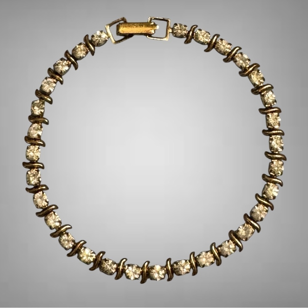 GOLD TONE AND RHINESTONES BRACELET